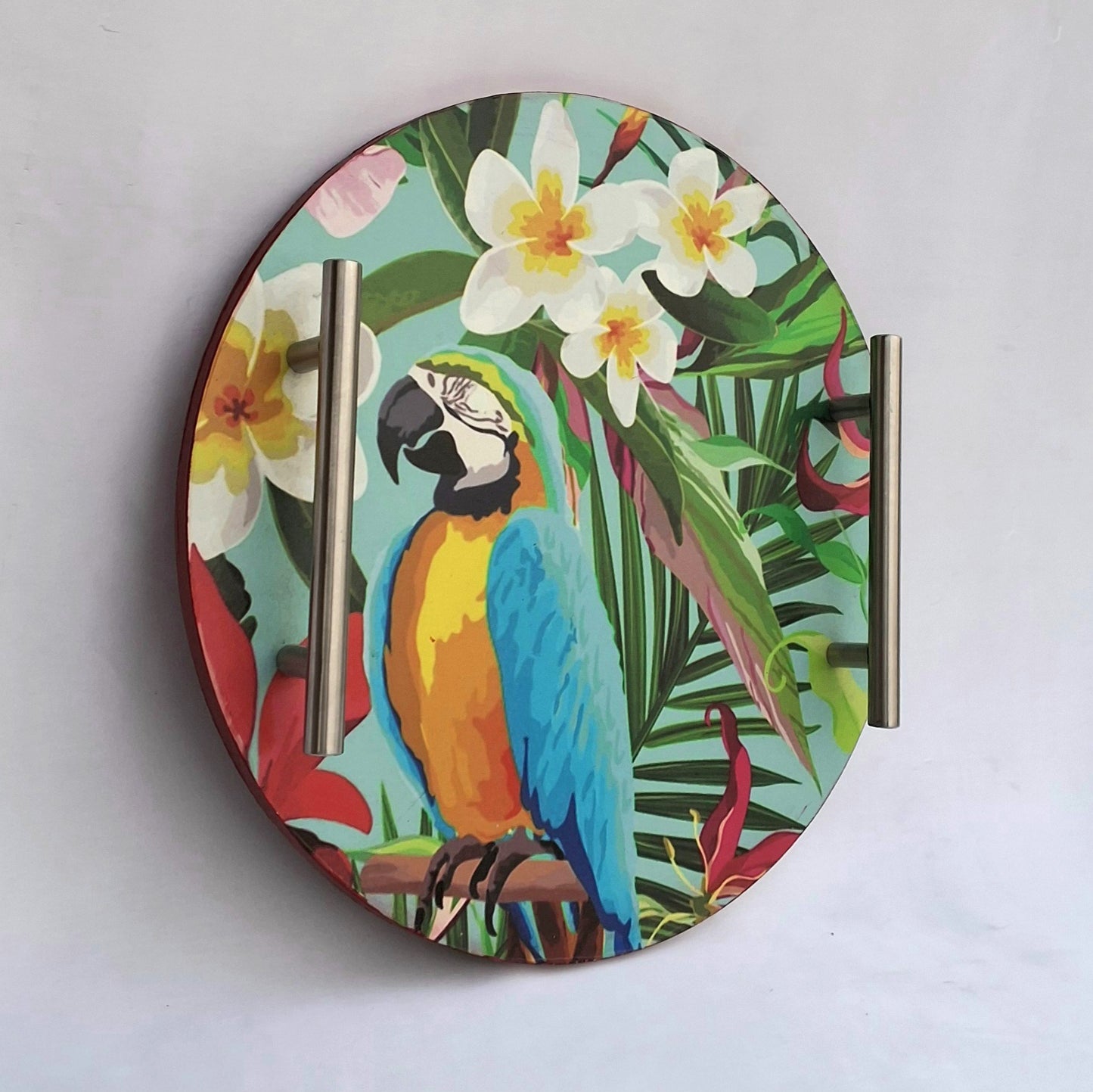 Wooden tray in Pakistan featuring a colorful print of Macaw, flowers and leaves.