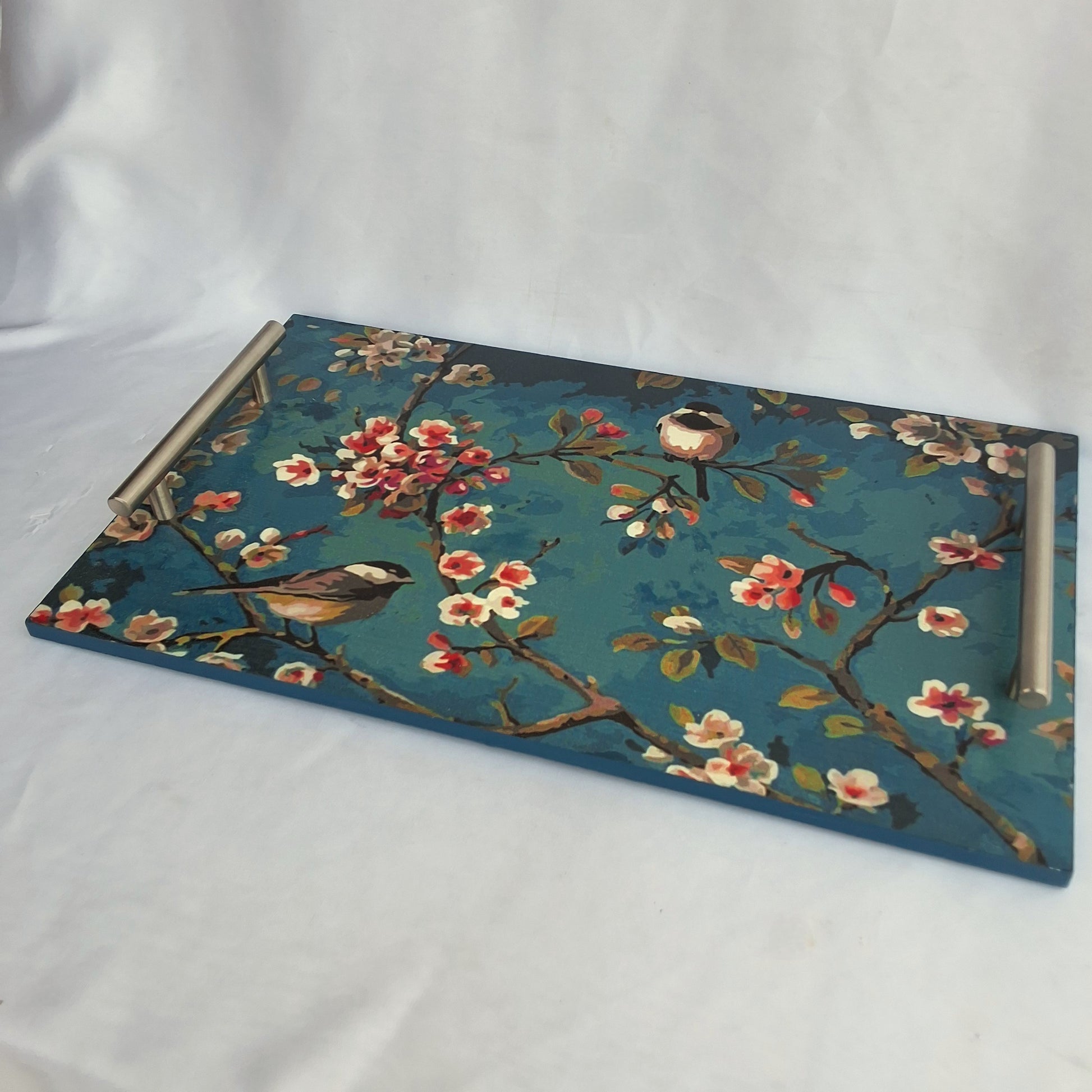 multipurpose wooden tray made in Pakistan. digitally printed floral tray used for serving , as vanity tray or decorative tray. Makes a good gift 
