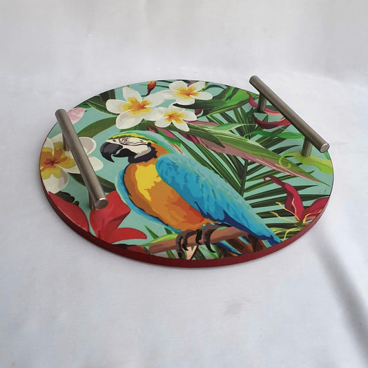 Wooden tray in Pakistan featuring a colorful print of Macaw, flowers and leaves. 