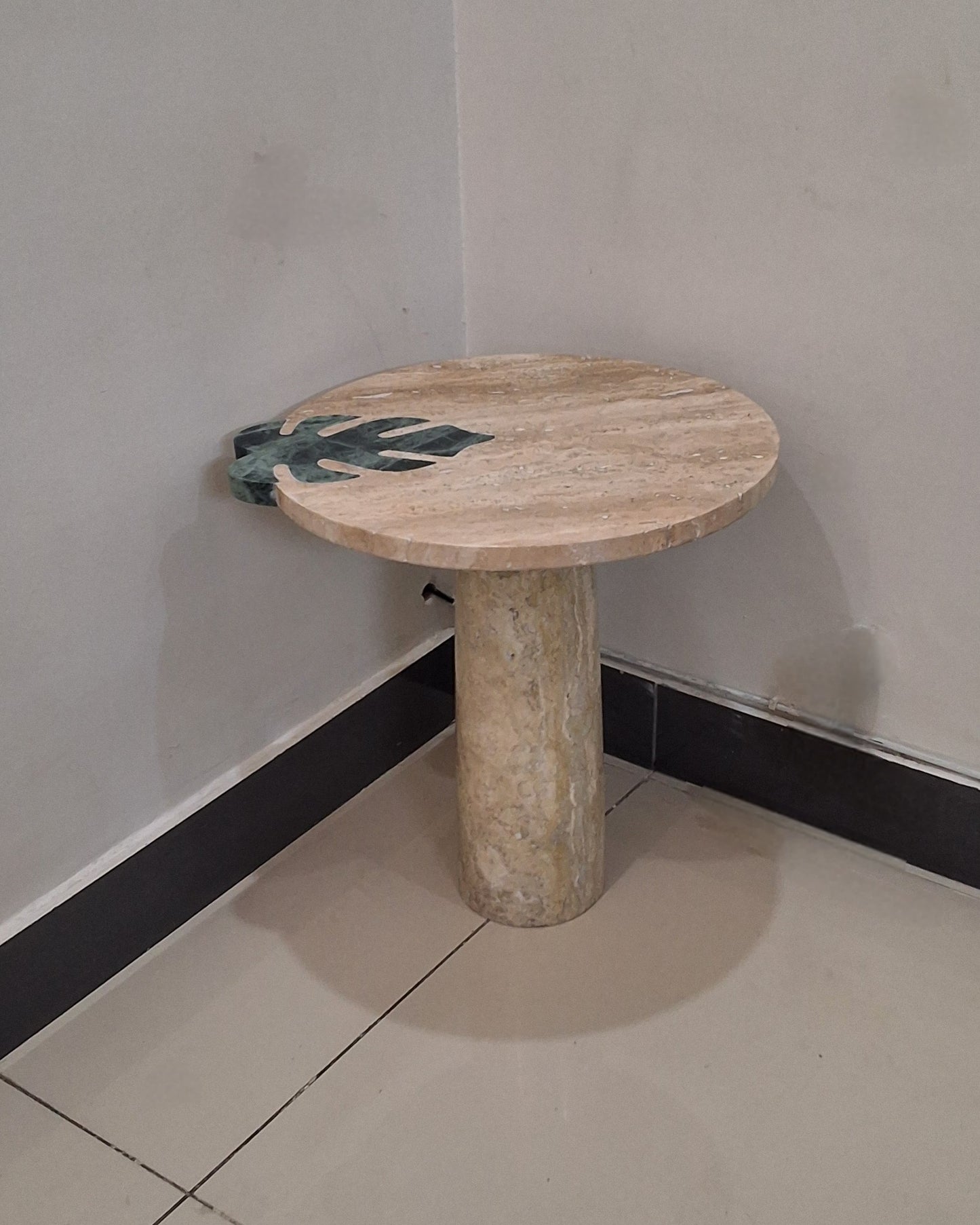 handmade Travertine and Marble table crafted using Pietra Dura technique. luxurious home decor in Pakistan. 