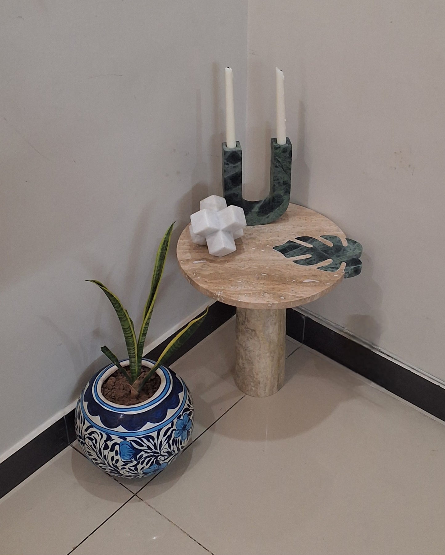 handmade Travertine and Marble table crafted using Pietra Dura technique. luxurious home decor in Pakistan. 