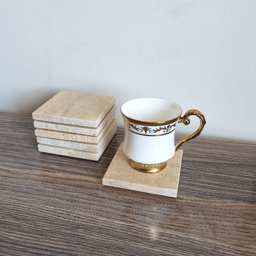 Travertine coasters. Hand crafted natural stone coasters in Pakistan. Marble coasters pakistan. Travertine coasters Pakistan. Cup coasters, mug coasters