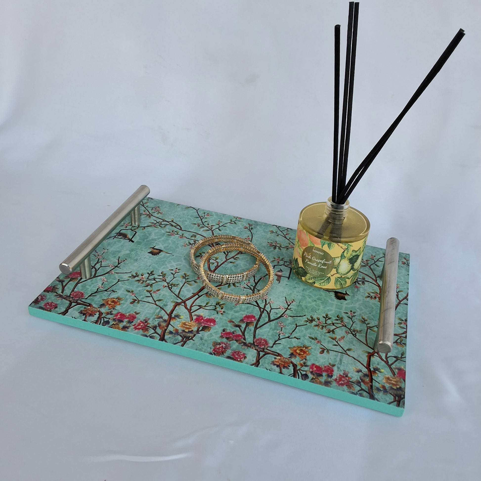 Digitally printed multipurpose wooden trays. Can be used as serving tray as a decorative tray or as a perfume tray. 