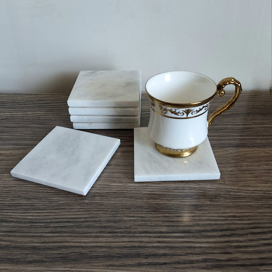 Ziarat white coasters. Hand crafted natural stone coasters in Pakistan. Marble coasters pakistan. Pakistan. Cup coasters, mug coasters