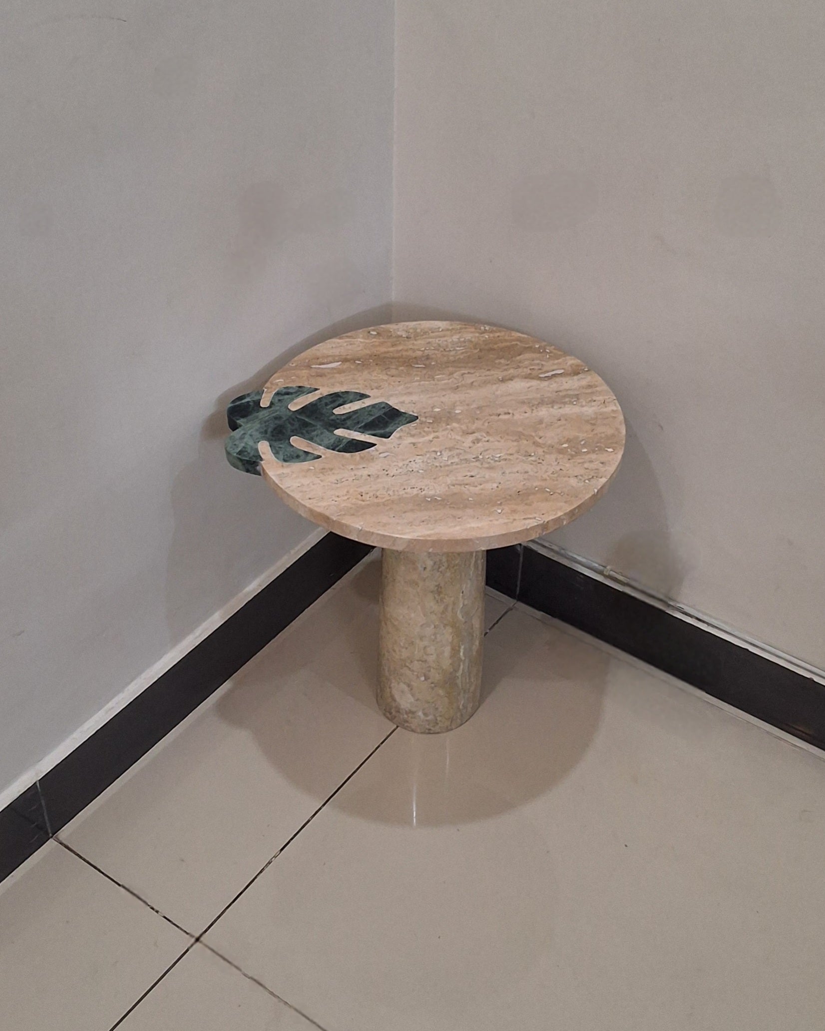 handmade Travertine and Marble table crafted using Pietra Dura technique. luxurious home decor in Pakistan. 
