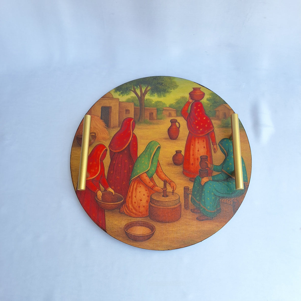 round wooden tray. digitally printed with picture of a Pakistani village showing Pakistani village women doing chores. serving tray, decorative tray. Pakistani culture